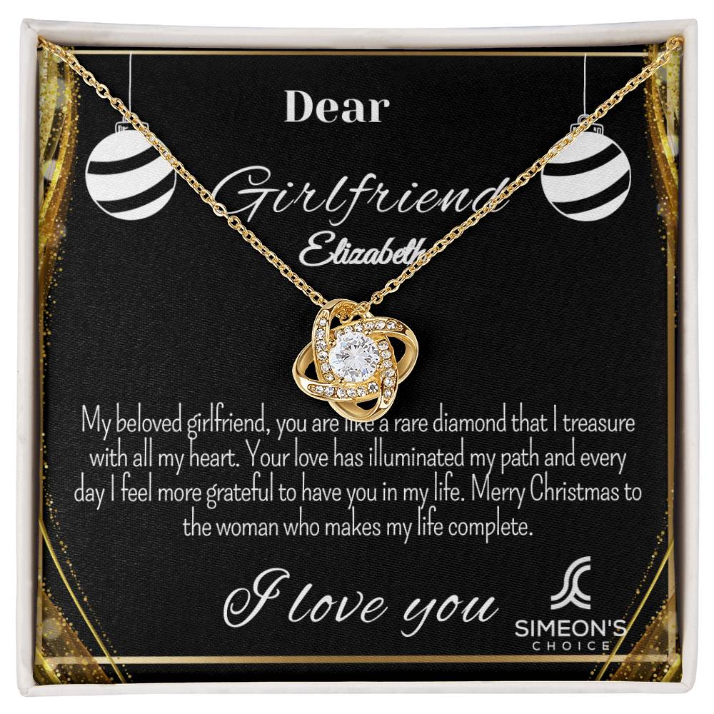 This elegant necklace features a Love Knot pendant that's studded with brilliant diamonds for a luxurious shimmer and customizable jewelry card. Crafted with precious metals, this stunning necklace is the perfect way to express your love.