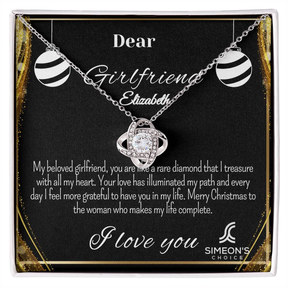 This elegant necklace features a Love Knot pendant that's studded with brilliant diamonds for a luxurious shimmer and customizable jewelry card. Crafted with precious metals, this stunning necklace is the perfect way to express your love.