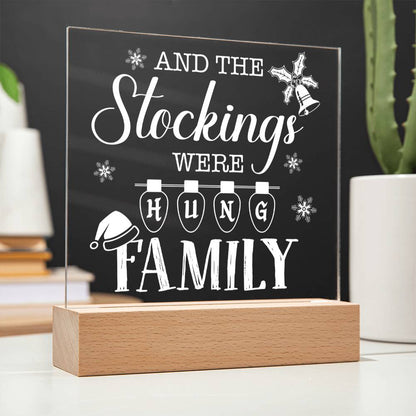 This whimsical plaque is the perfect way to add a little holiday cheer to your home! Crafted of durable acrylic, the Stockings Were Hung Family plaque will make a unique and festive addition to your mantle. Hang it up and get your seasonal celebrations started!