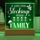 This whimsical plaque is the perfect way to add a little holiday cheer to your home! Crafted of durable acrylic, the Stockings Were Hung Family plaque will make a unique and festive addition to your mantle. Hang it up and get your seasonal celebrations started!