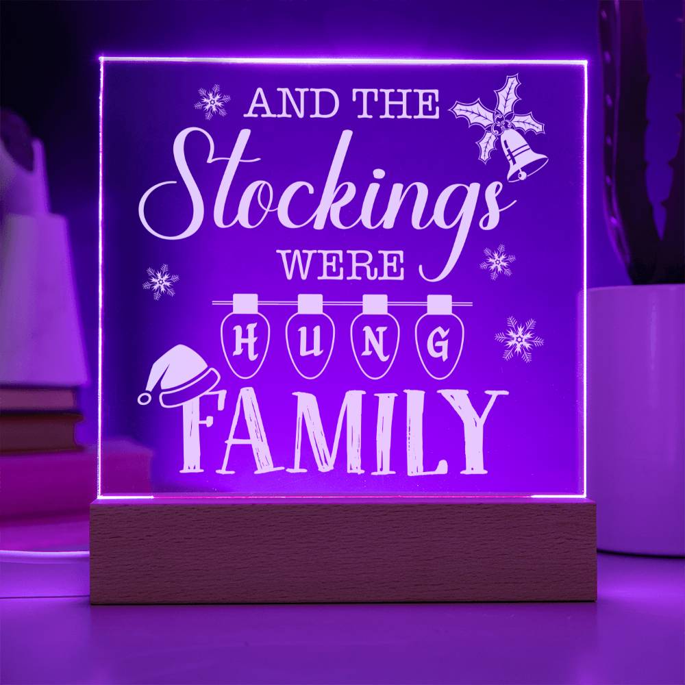 This whimsical plaque is the perfect way to add a little holiday cheer to your home! Crafted of durable acrylic, the Stockings Were Hung Family plaque will make a unique and festive addition to your mantle. Hang it up and get your seasonal celebrations started!