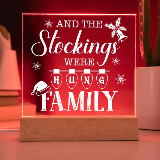 This whimsical plaque is the perfect way to add a little holiday cheer to your home! Crafted of durable acrylic, the Stockings Were Hung Family plaque will make a unique and festive addition to your mantle. Hang it up and get your seasonal celebrations started!