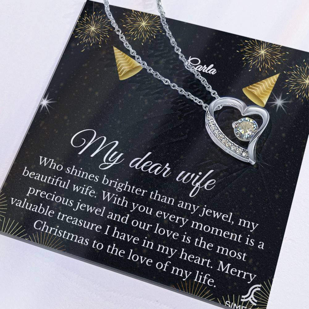 Give your loved one a special gift with this beautiful My Dear Wife Holiday Collection Forever Love Necklace. Crafted with exquisite and durable materials, this necklace is a timeless symbol of love. It's made even more meaningful with a customizable jewelry card. Celebrate the holiday season with this perfect gift.